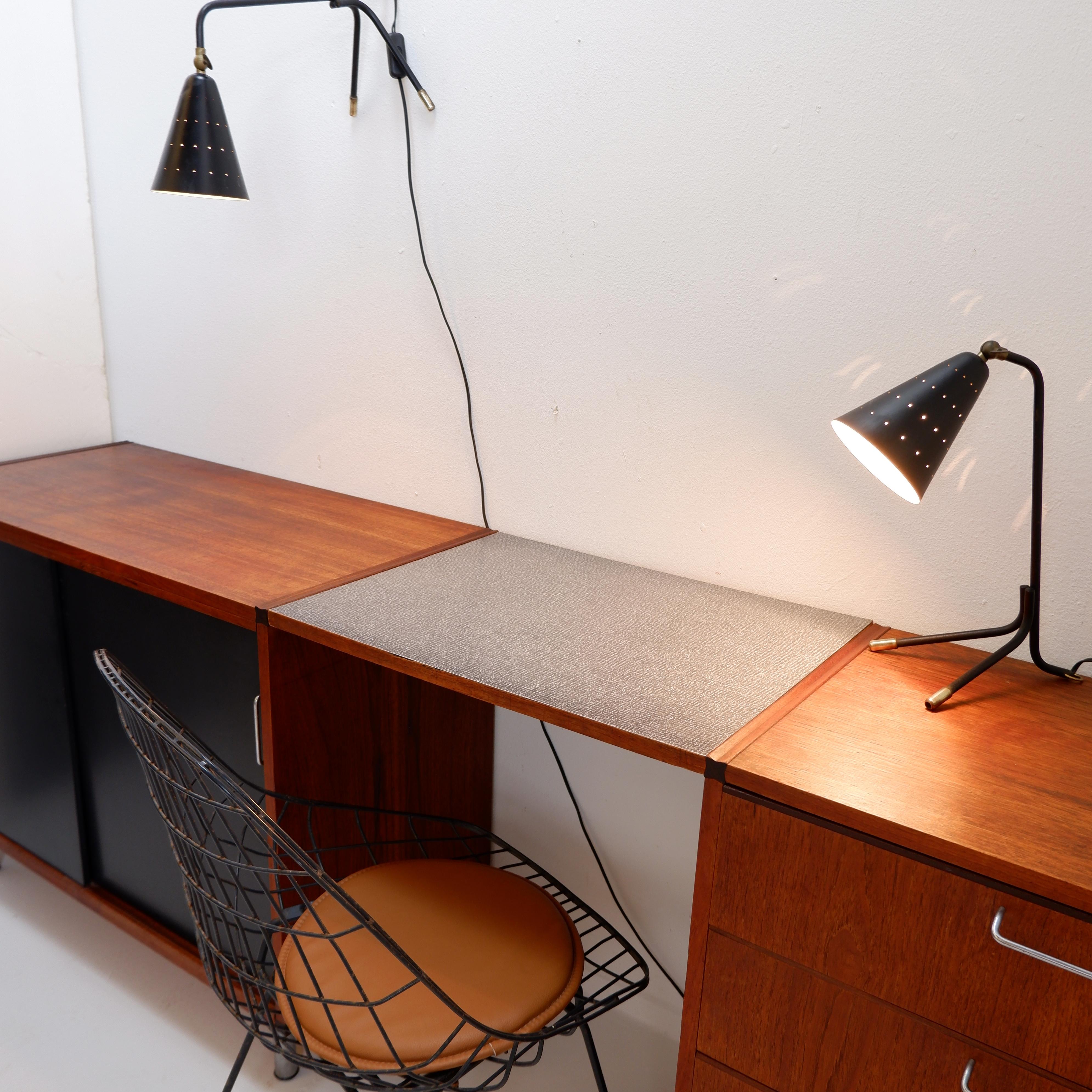 Svend Aage Holm Sørensen pair of lamps Holm Sørensen Edition - 1950s
Danish Mid-Century designer
Measures : 17x28cm H:37cm 
Materials : Lacquered metal - Brass
Danish designer Svend Aage Holm Sørensen (1913-2004) is known for his lighting fixtures,