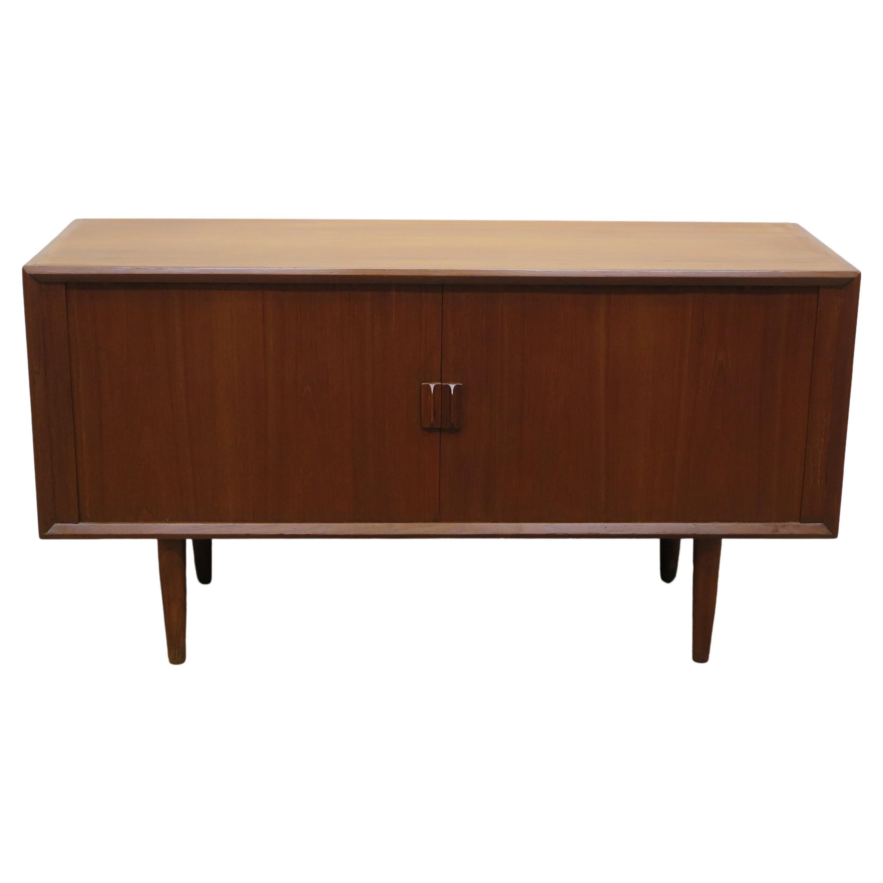  Svend Aage Larsen Credenza Sideboard.  Iconic Mid century Modern Teak Credenza Sideboard complete with original top Display case.  This is a complete unit in very good condition, all original including glass doors.  One of the most iconic mid