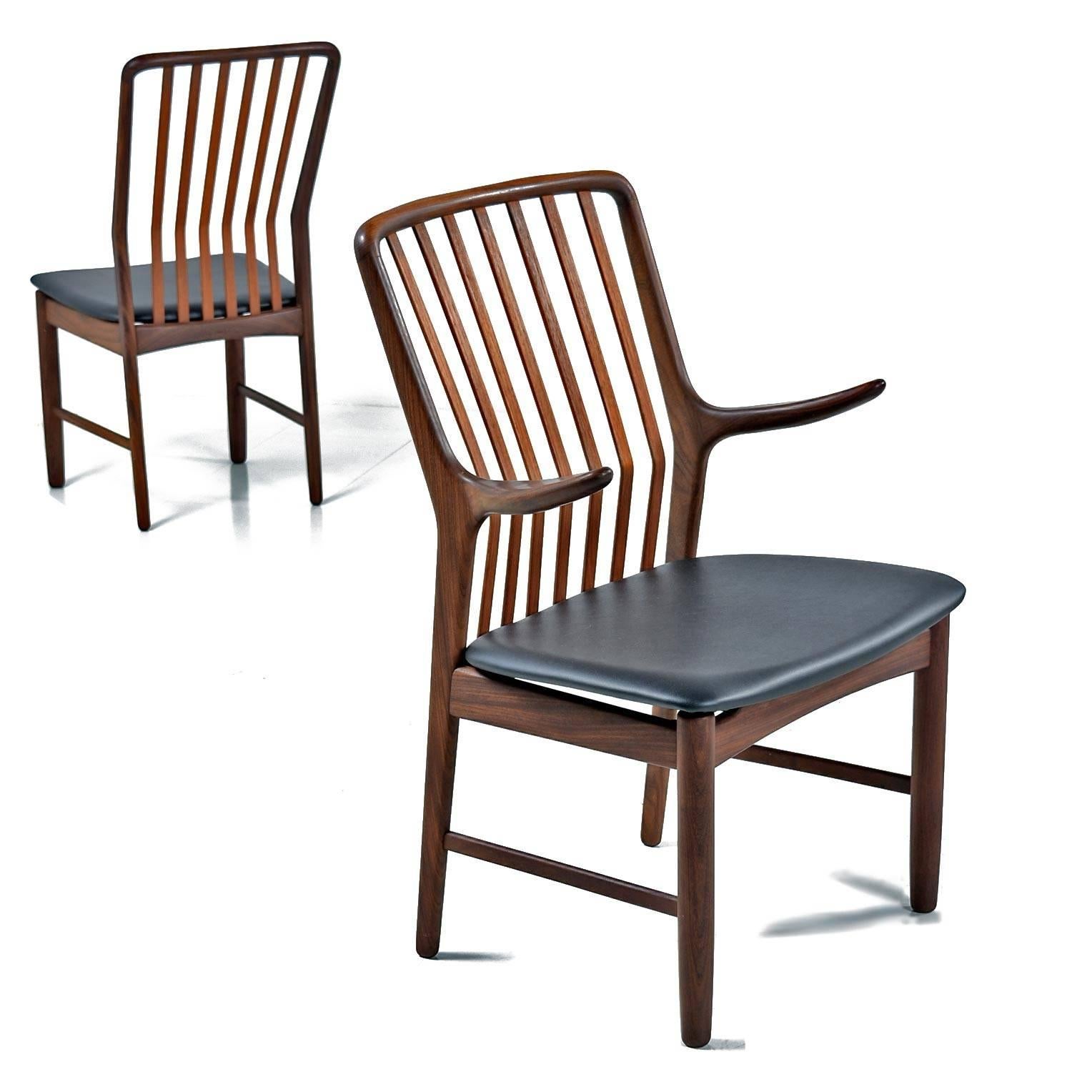 Not only is this a set of (six), but it includes (two) of the sought after arm chairs. The width of these captain chairs is very accommodating which isn't particularly common, they are comfortably roomy. The floating arms paired with the slightly