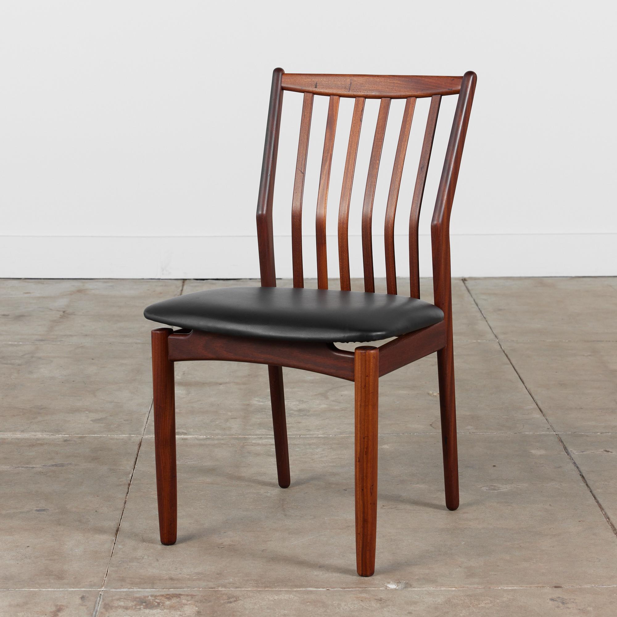 Svend A. Madsen Afrormosia teak chair for Moreddi, circa 1960s, Denmark. The chair features a slatted curved backrest and wide black Naugahyde seat.

Dimensions
17.5