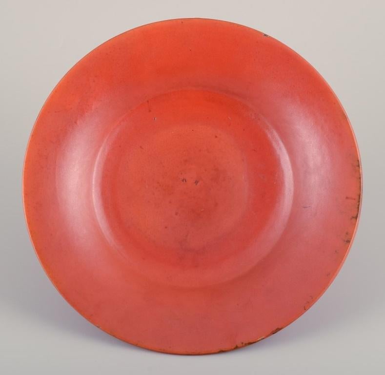 Svend Hammershøi (1873-1948) for Kähler. Large round low bowl in uranium glaze.
Approximately from the 1930s.
Marked.
In excellent condition with a few small chips at the top of the bowl. See photo.
Provenance, from Børge Christiansen's