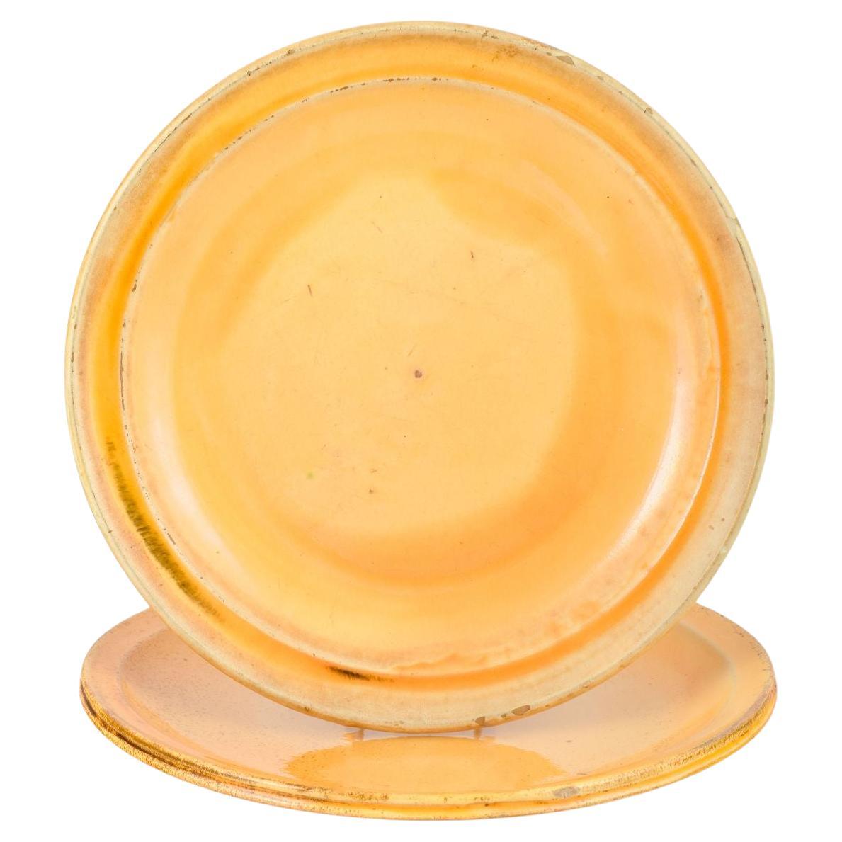 Svend Hammershøi per Kähler, due piatti in ceramica con smalto all'uranio.