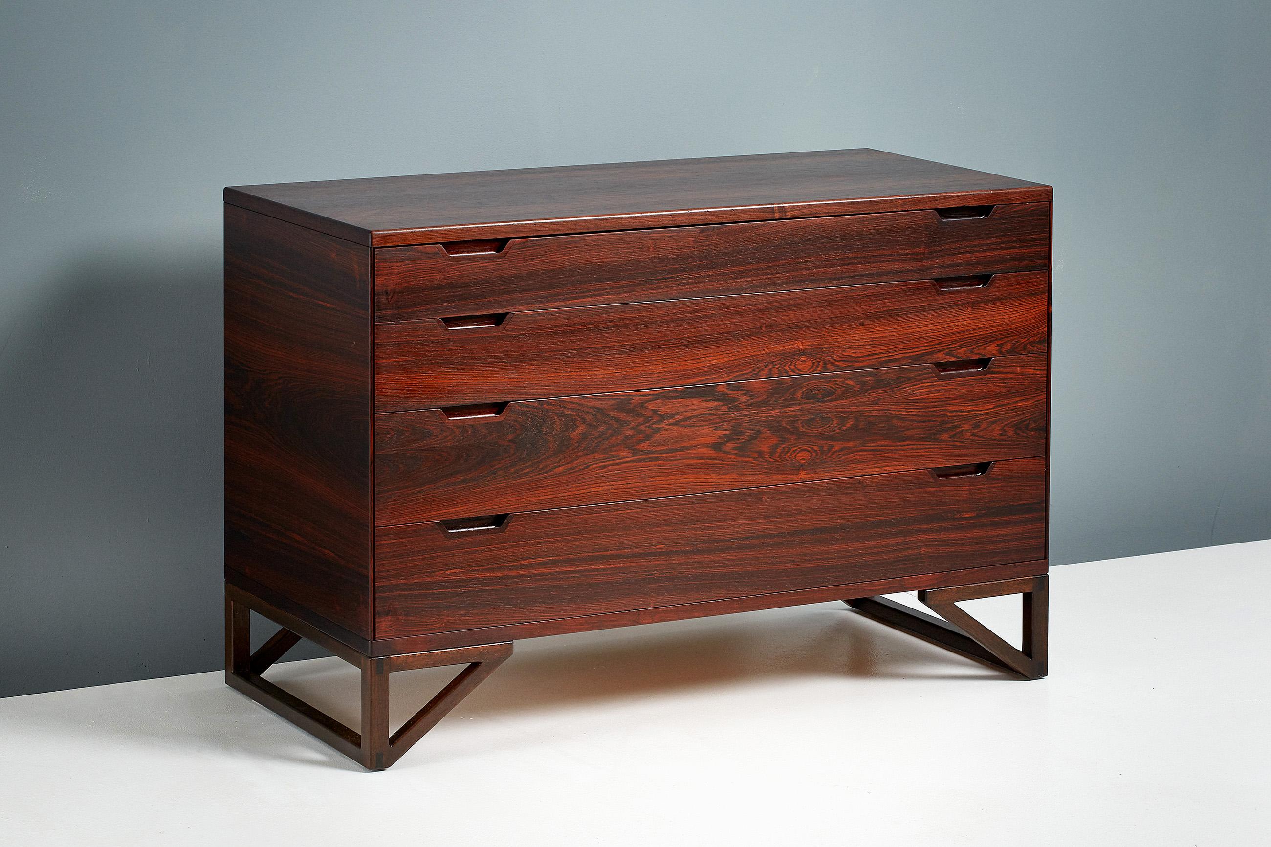 Svend Langkilde
Chest of drawers, circa 1960

Chest of drawers made from exquisite rosewood designed by Sven Langkilde and produced by his own company Langkilde Mobler. The base frame and drawer liners are made from mahogany. The chest features