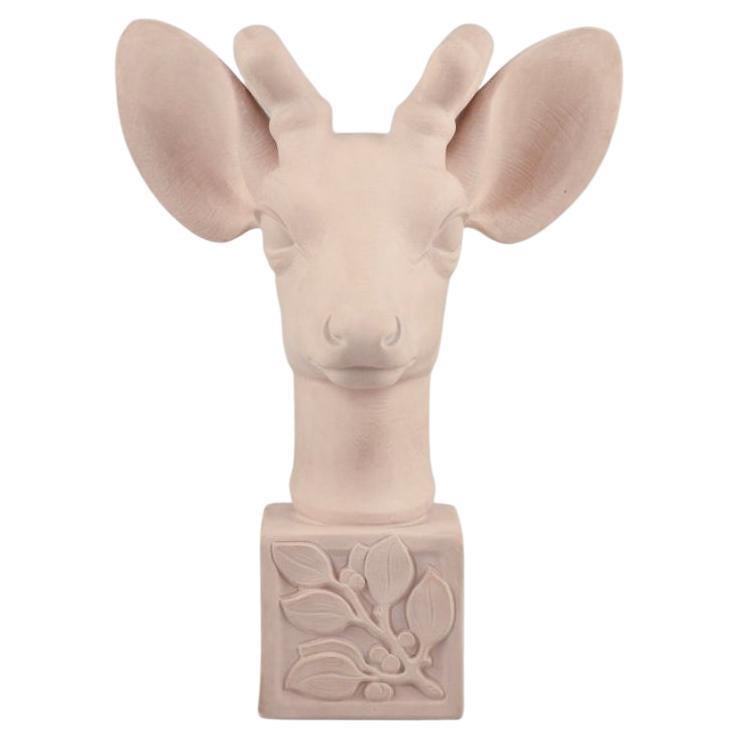 Svend Lindhart, Denmark. Large sculpture of a deer head on a plinth.