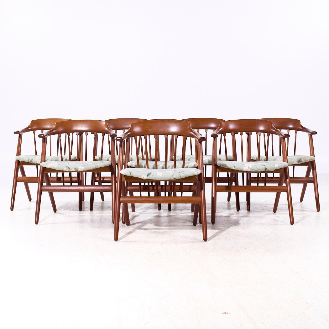 Svend Madsen Style Mid Century Danish Teak Dining Chairs - Set of 8

Each chair measures: 23 wide x 20.5 deep x 29.5 inches high, with a seat height of 17 and arm height/chair clearance of 25.5 inches

All pieces of furniture can be had in what we