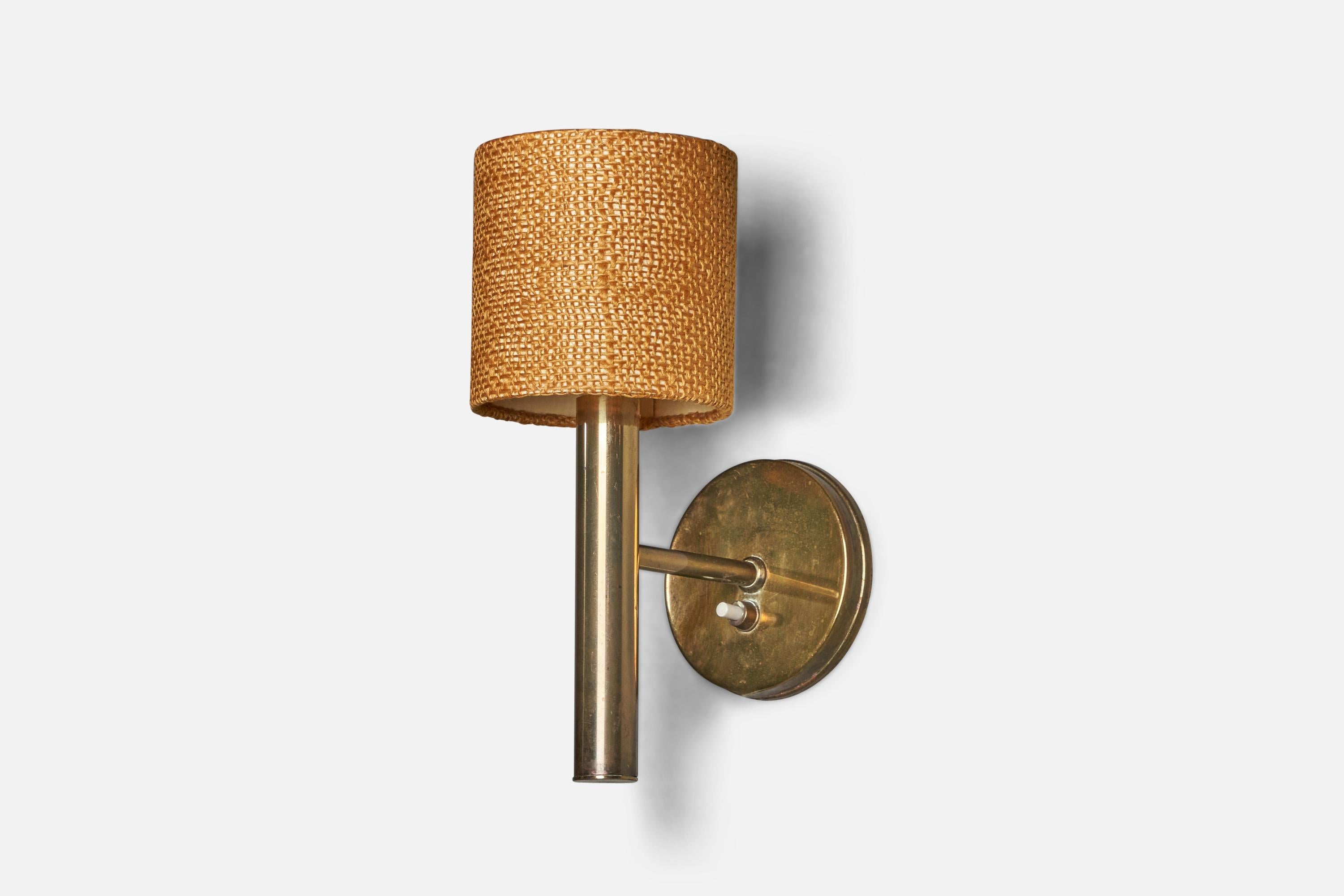 A brass and woven orange beige fabric wall light designed by Svend Mejlstrøm and produced by MS Belysning, Norway, 1960s.

Overall Dimensions (inches): 9.75” H x 3.75” W x 6” D
Back Plate Dimensions (inches): 3.9” Diameter
Bulb Specifications: E-14
