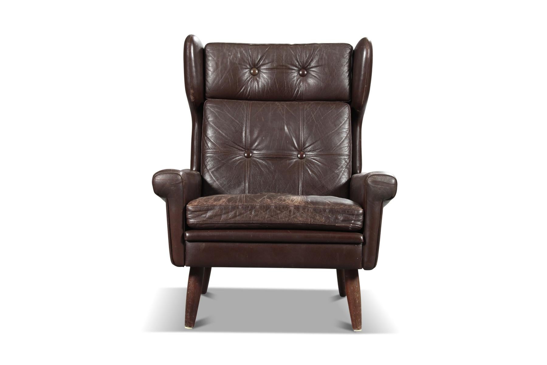 Danois Svend Skipper fauteuil de salon à dossier haut en cuir brun patiné en vente