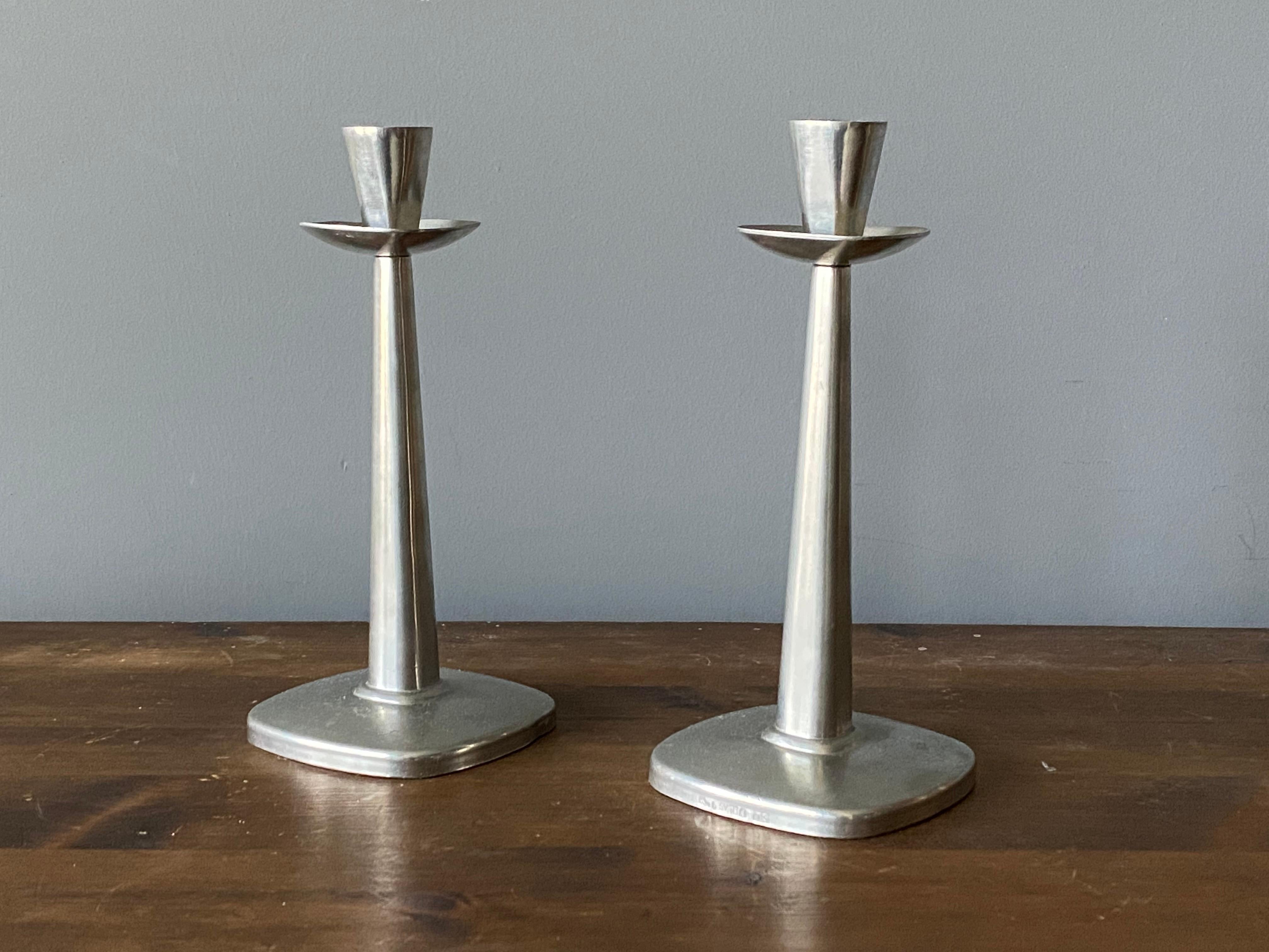 A pair of candlesticks / candleholders. Stamped ESM Sv. Tenn.