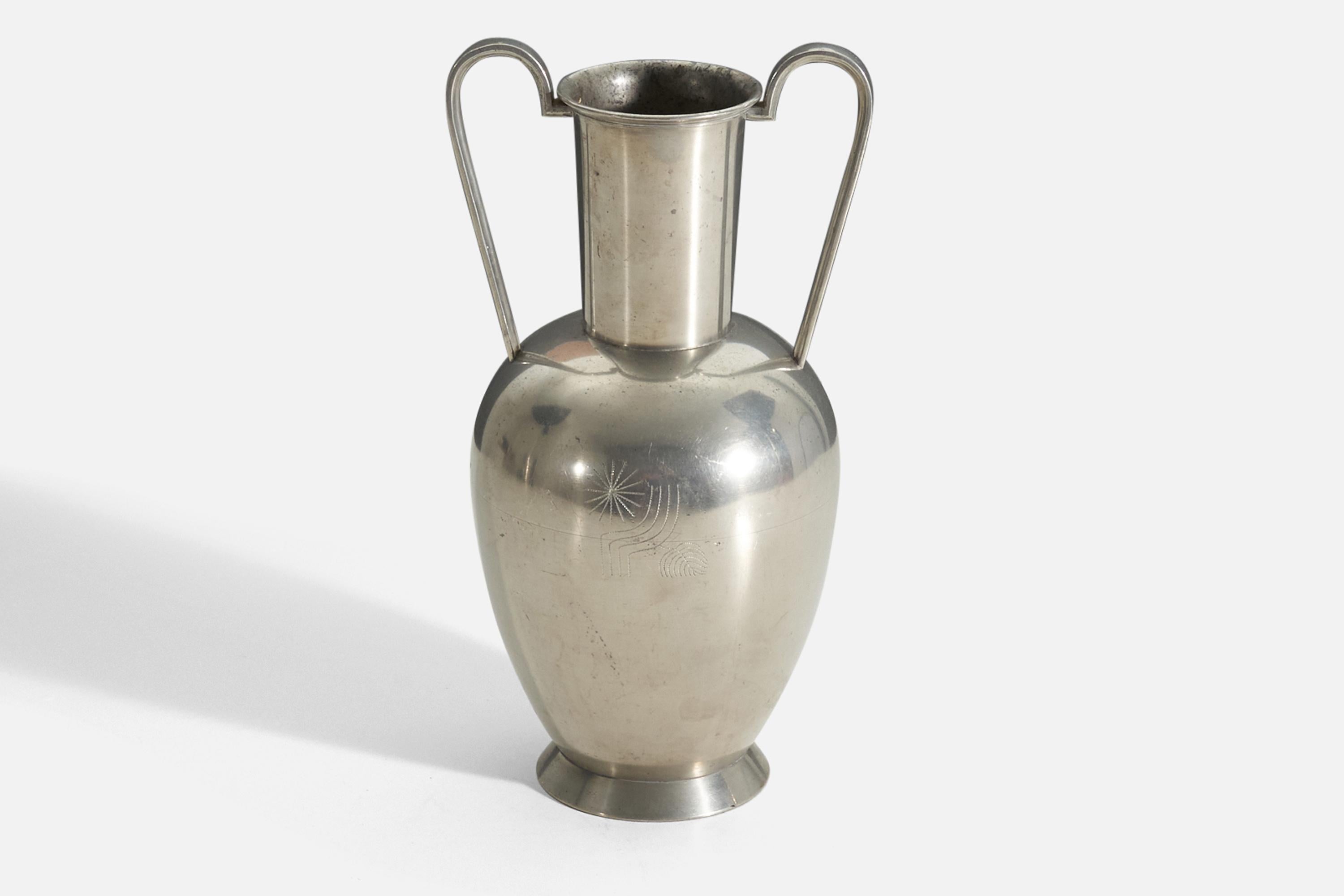 A vase / vessel / trophy in cast pewter featuring engravings from 1935. Stamped with the Svenskt Tenn maker's mark.
 