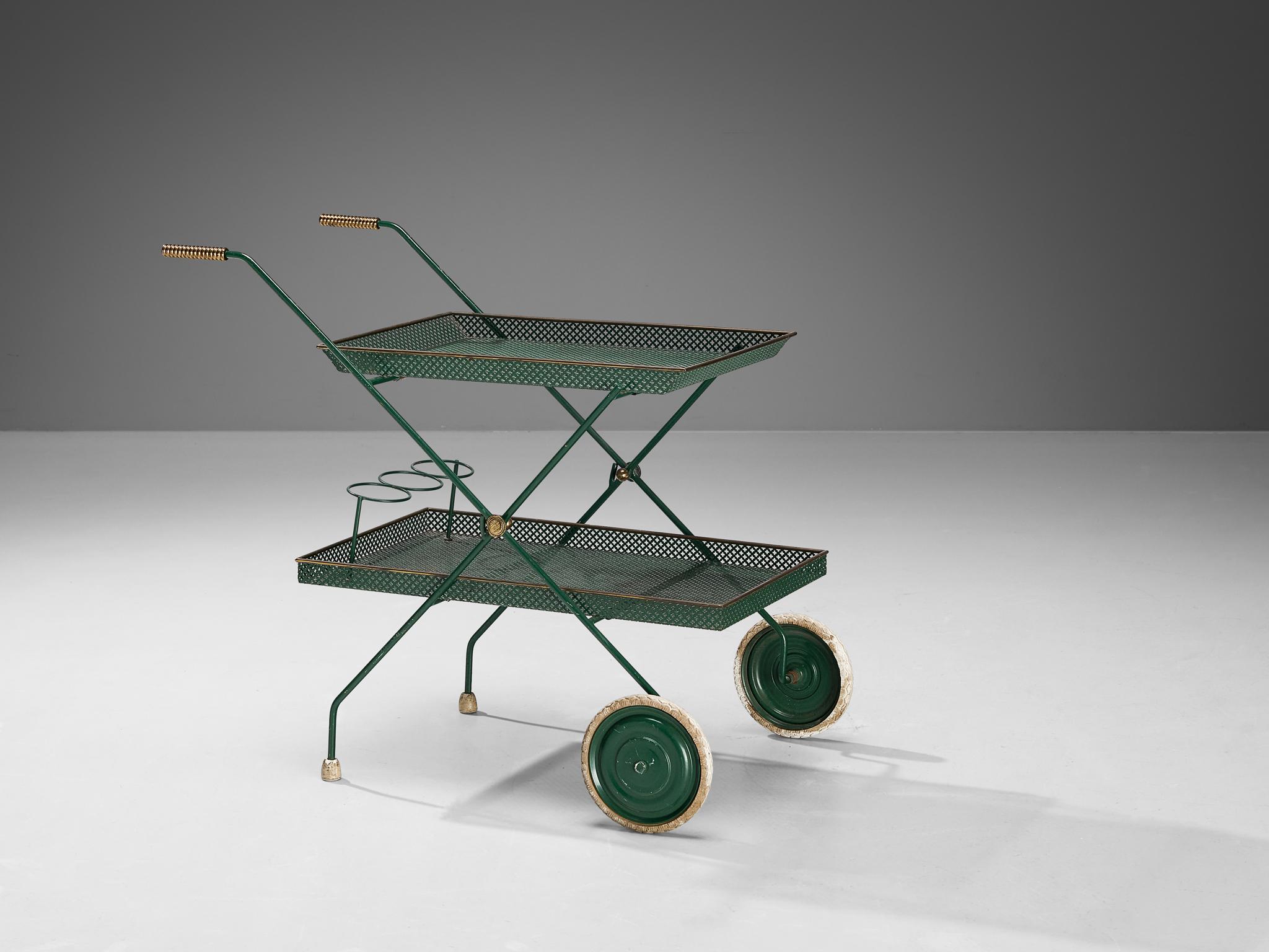 Svenskt Tenn, bar cart or serving trolley, brass, lacquered metal, Sweden, 1950s

Practical and modern bar cart by Swedish manufacturer Svenskt Tenn, made in the 1950s. This design is made out of green lacquered perforated metal and has elegant