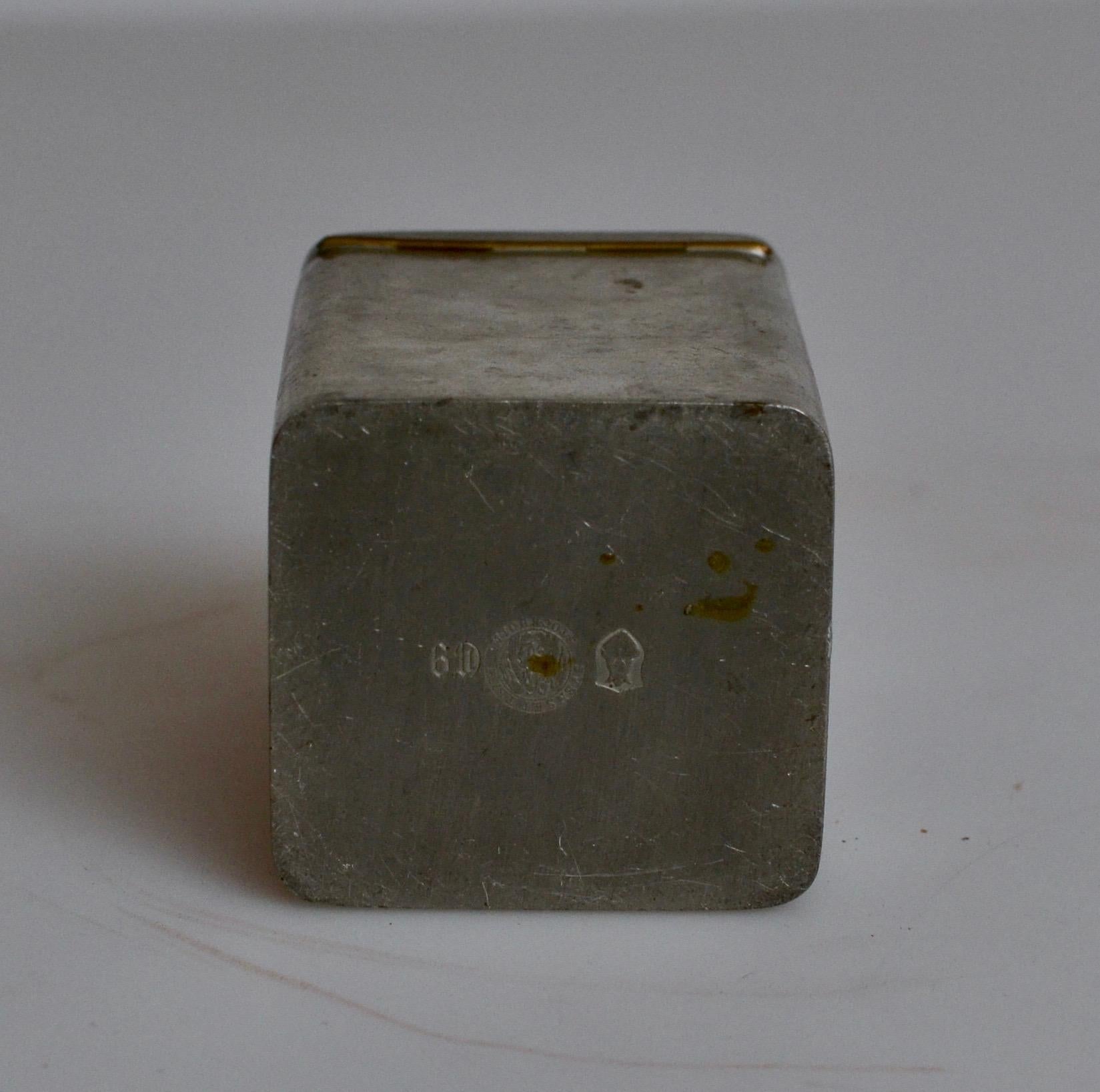 A Swedish pewter cigarette box with an agate inset in the lid. Stamped 