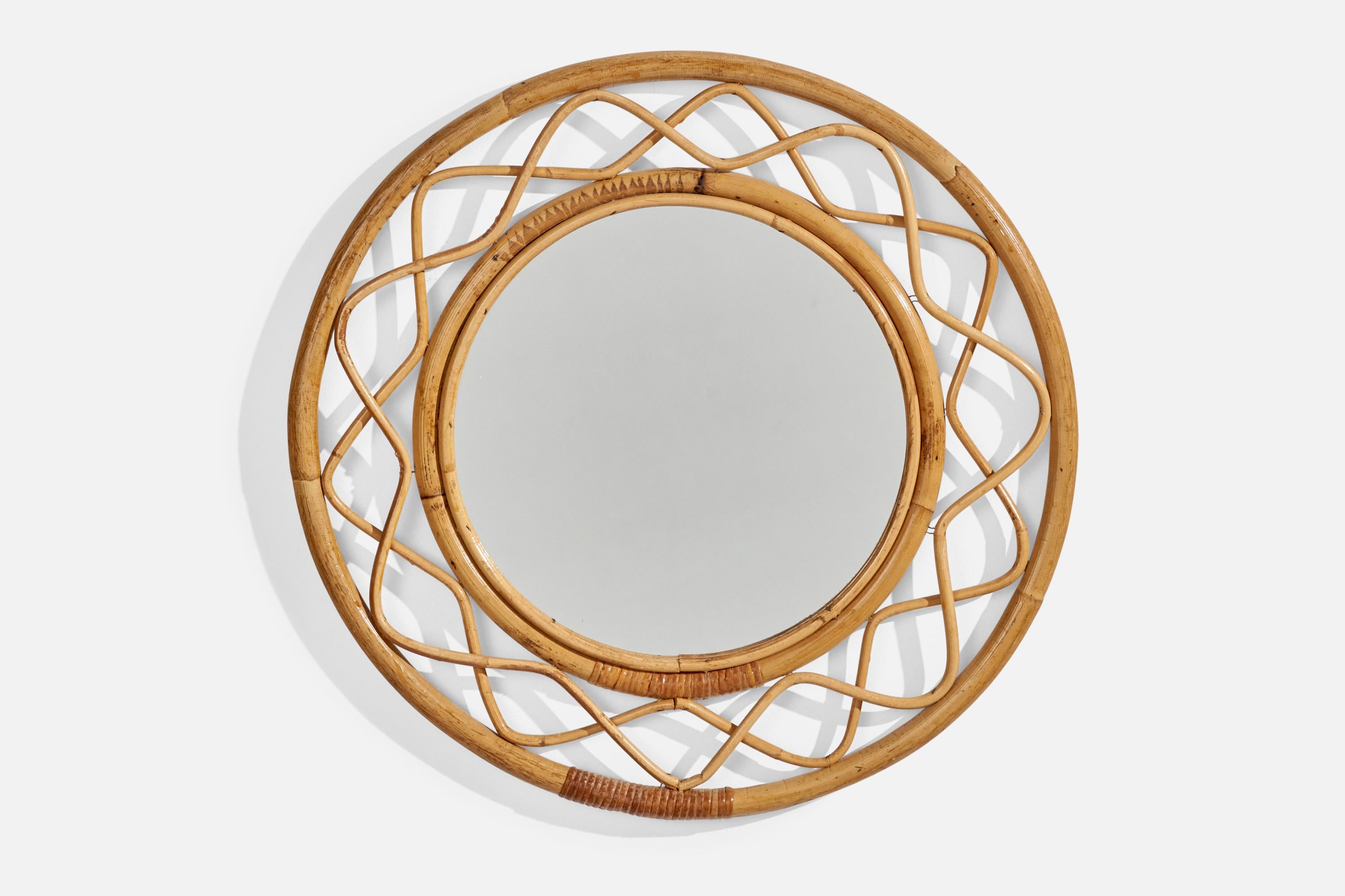 A wicker and bamboo wall mirror designed and produced by Svenskt Tenn, Sweden, 1950s. 