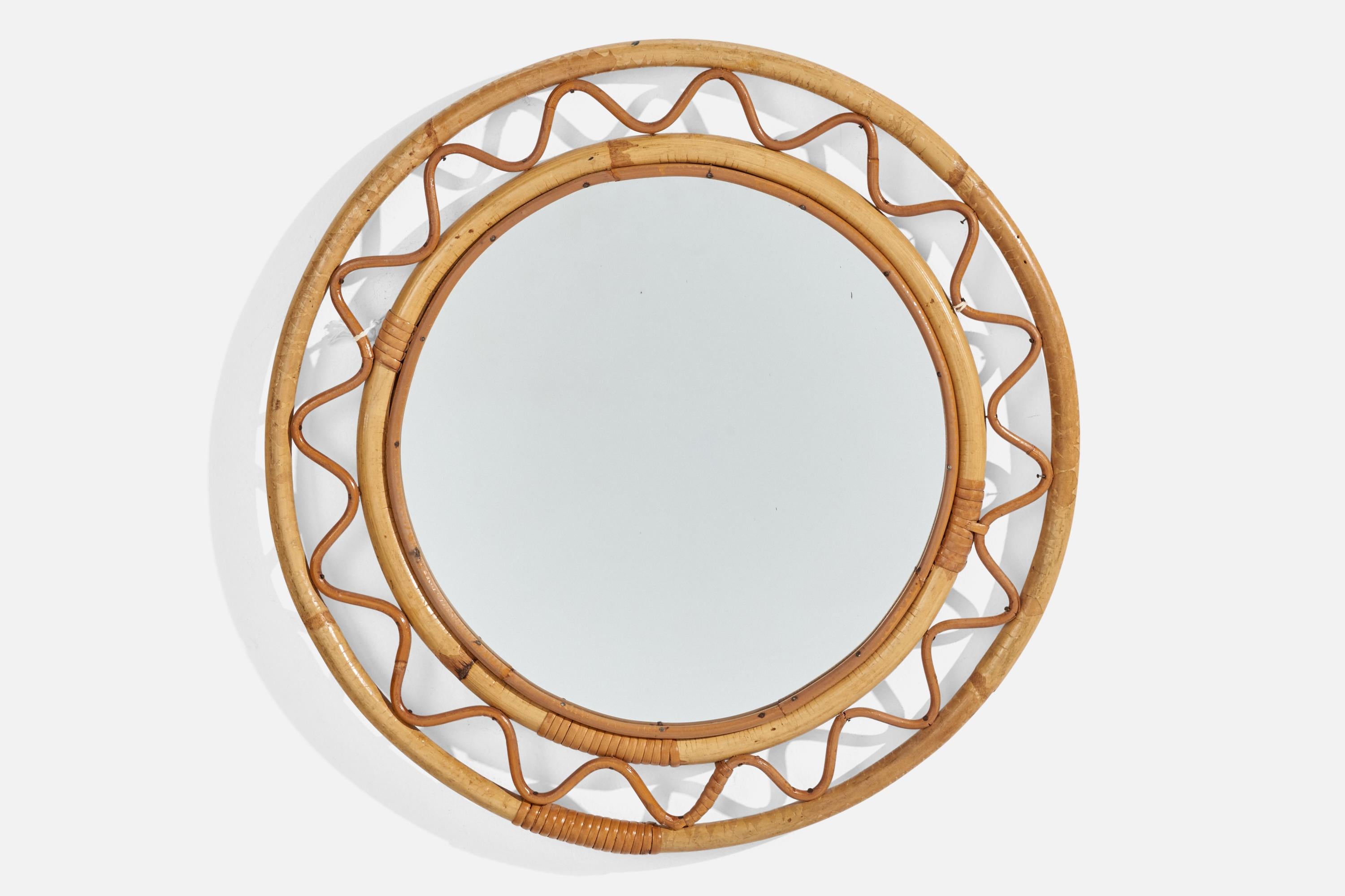 A bamboo and woven wicker wall mirror designed and produced by Svenskt Tenn, Sweden, 1950s. 