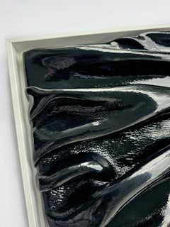 Plegables lacados en negro