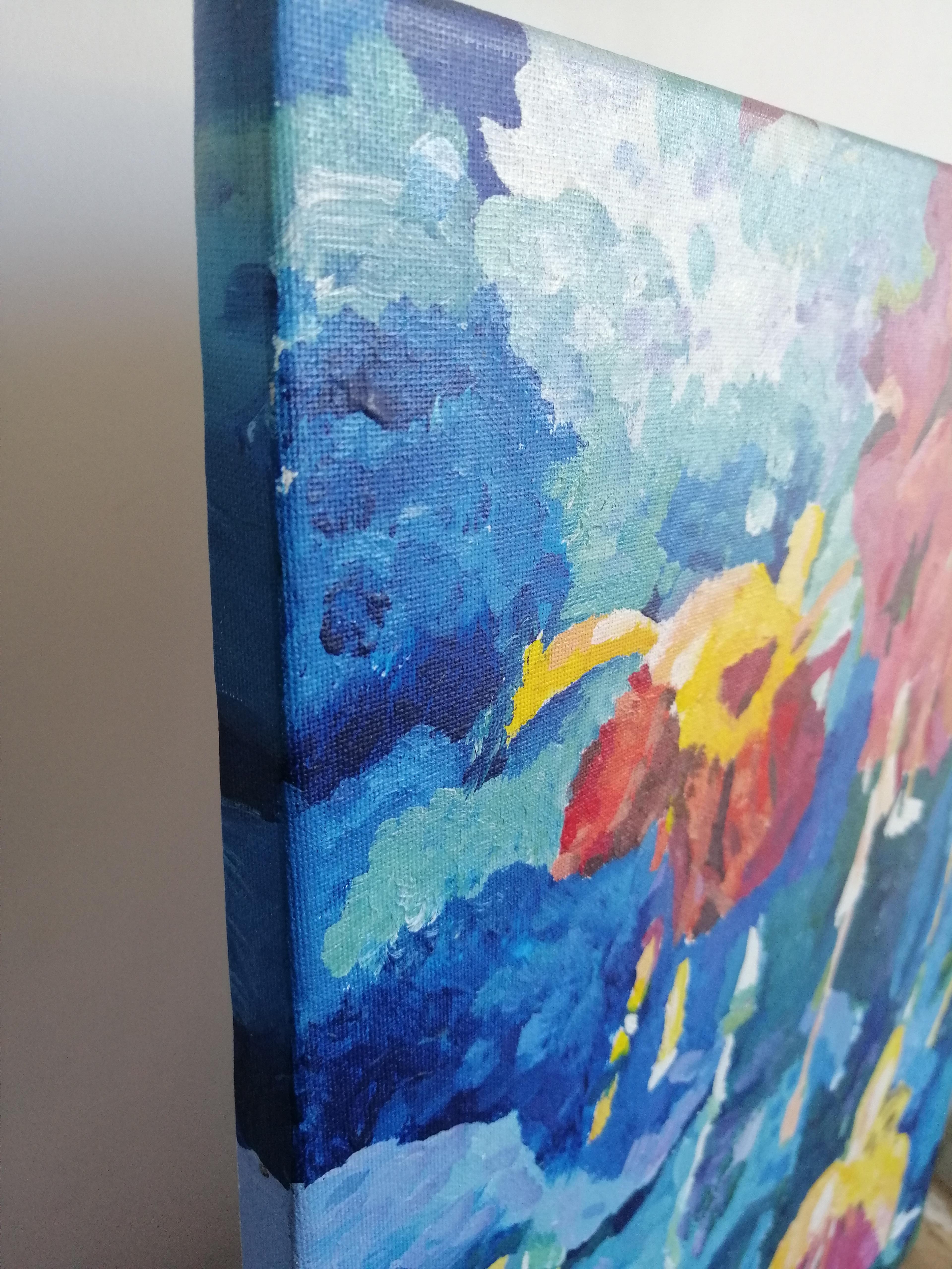 On a small canvas painted with acrylics, delicate fuchsia flowers bloom gracefully. They seem to come to life against the sky-blue background, playing with shades of pink and purple. Bold, expressive brushstrokes give the flowers depth and texture,
