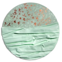 Golden branch on a mint green background. 3D textured.