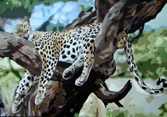 Leopard resting on a tree