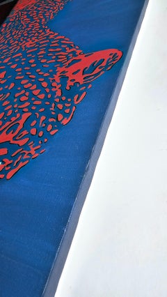 Roter Leopard auf Blau