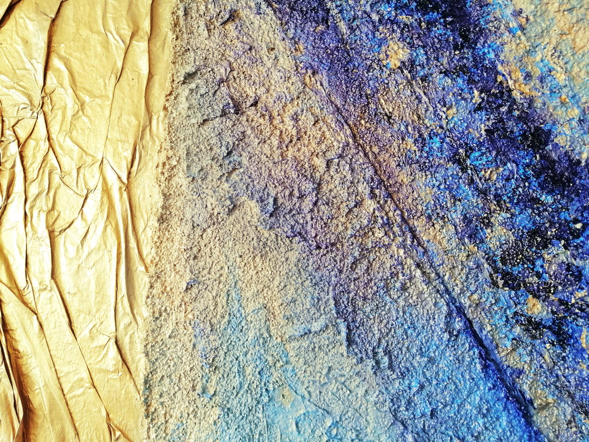 This is an abstract work on canvas, created in mixed media using paper, modeling paste, acrylic, and spray paint. The composition is built on an expressive combination of rich gold, blue, and violet tones.

In the upper left corner, there is a