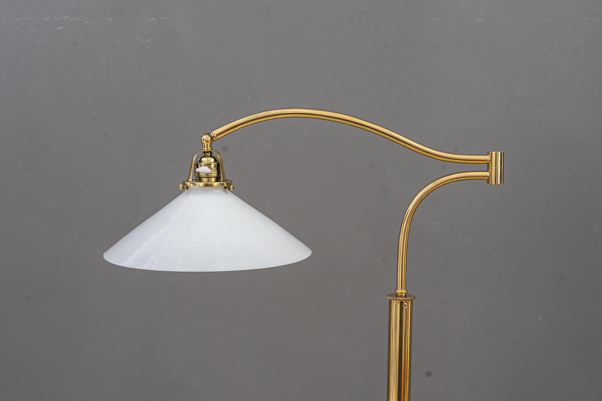 Sviweling and hight Adjustable Art Deco Floor lamp vienna around 1920s
Adjustable from 148cm up to 171cm
Brass polished and stove enameled
