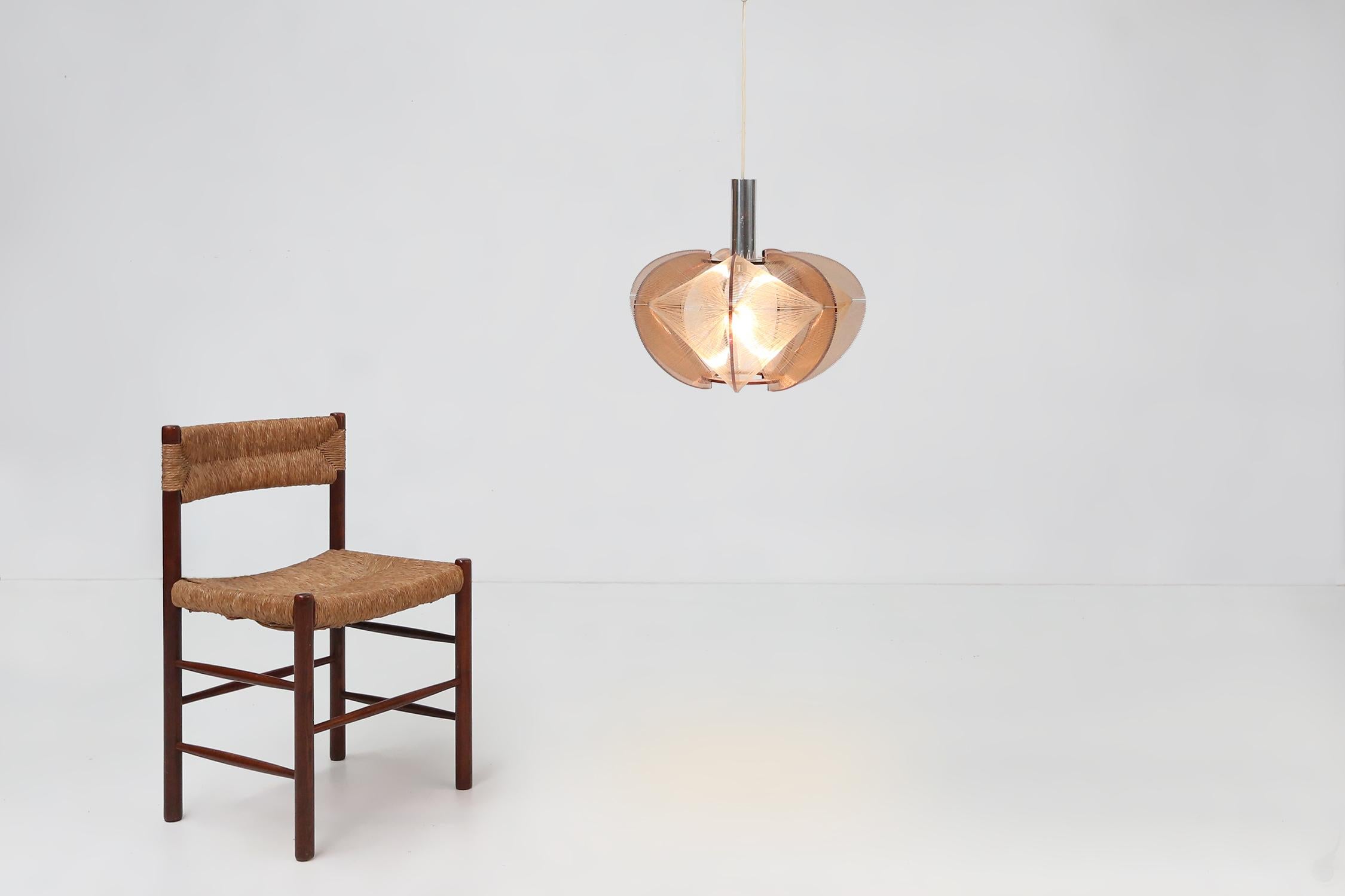 Germany / 1960 / Pendant lamp / Paul Secon / Sompex / perspex and nylon / mid-century

A stunning mid-century design classic Swag pendant lamp by designer Paul Secon, for Sompex. Made in Germany in the 1970s. The pendant lamp is made of a Plexiglas