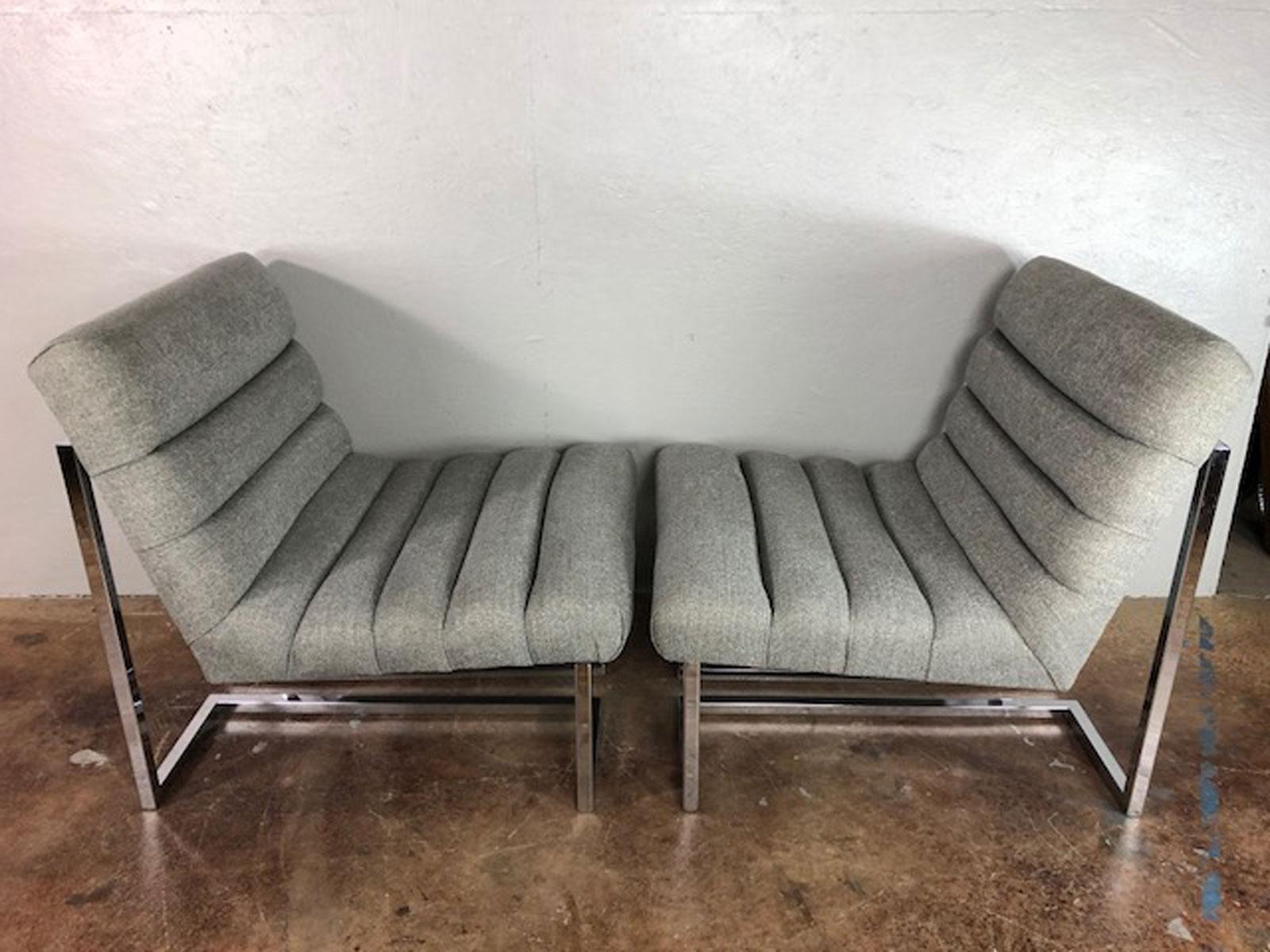 A pair of reupholstered Swaim design lounge chairs. Unique. Unusual. Statement pair, circa 1970s.