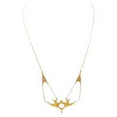 Swallows Art Nouveau French necklace in 18k gold, natural pearls birds drapery