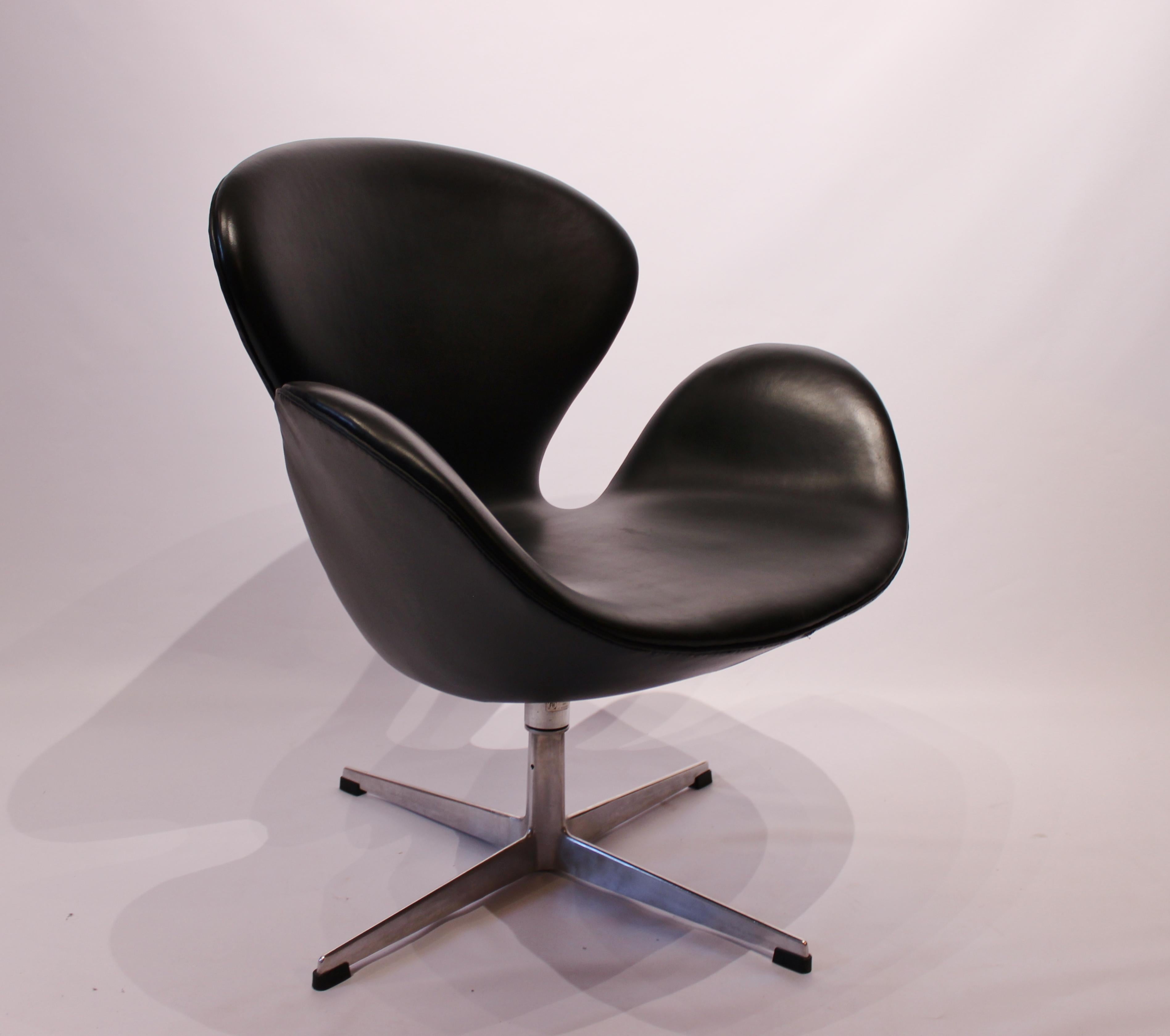 Swan chair, model 3320, designed by Arne Jacobsen in 1958 and manufactured by Fritz Hansen in 1950s. The chair is with original upholstery in black leather.