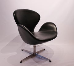 The "Swan" Chair Model 3320 Made In Black Leather By Arne Jacobsen From 1950s