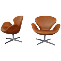 Swan Chairs in Cognac Leather by Arne Jacobsen for Fritz Hansen, 1969 Set of Two
