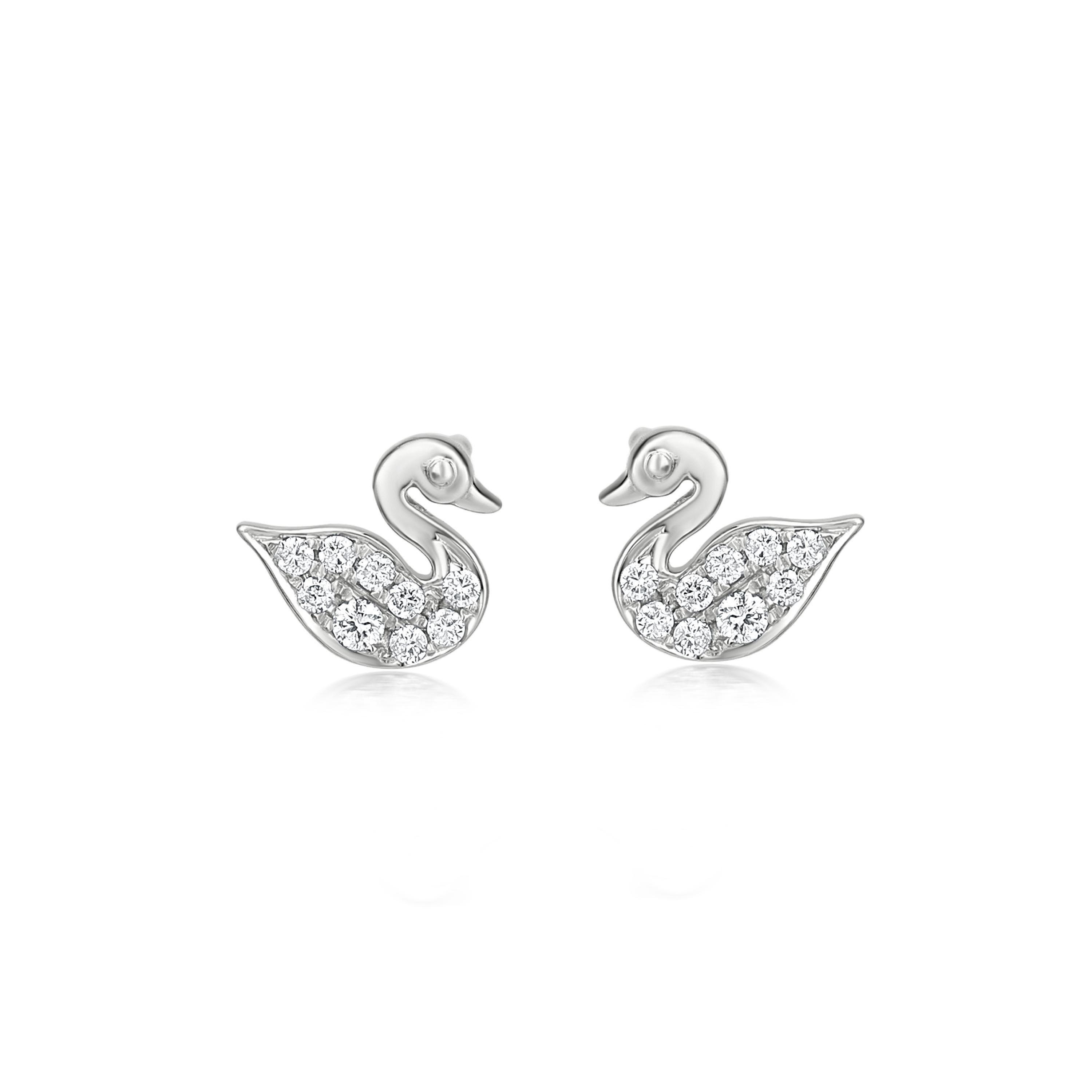 Subtle yet pretty this Luxle swan stud earrings is the new fashion statement. These stud earrings are featured with 18 round cut diamonds, totaling 0.13Cts embellished in swan motifs of 18K white gold. These stud earrings come with gold posts and