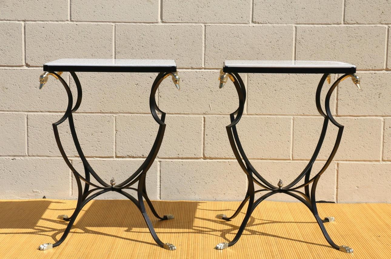 Spectacular pair of vintage side tables designed by Samuel Copelon, ( no signs ). They are original from the Mid 20th Century. These tables are  made of metal. They have brass swan heads and brass claw feet. These tables come with its original milk