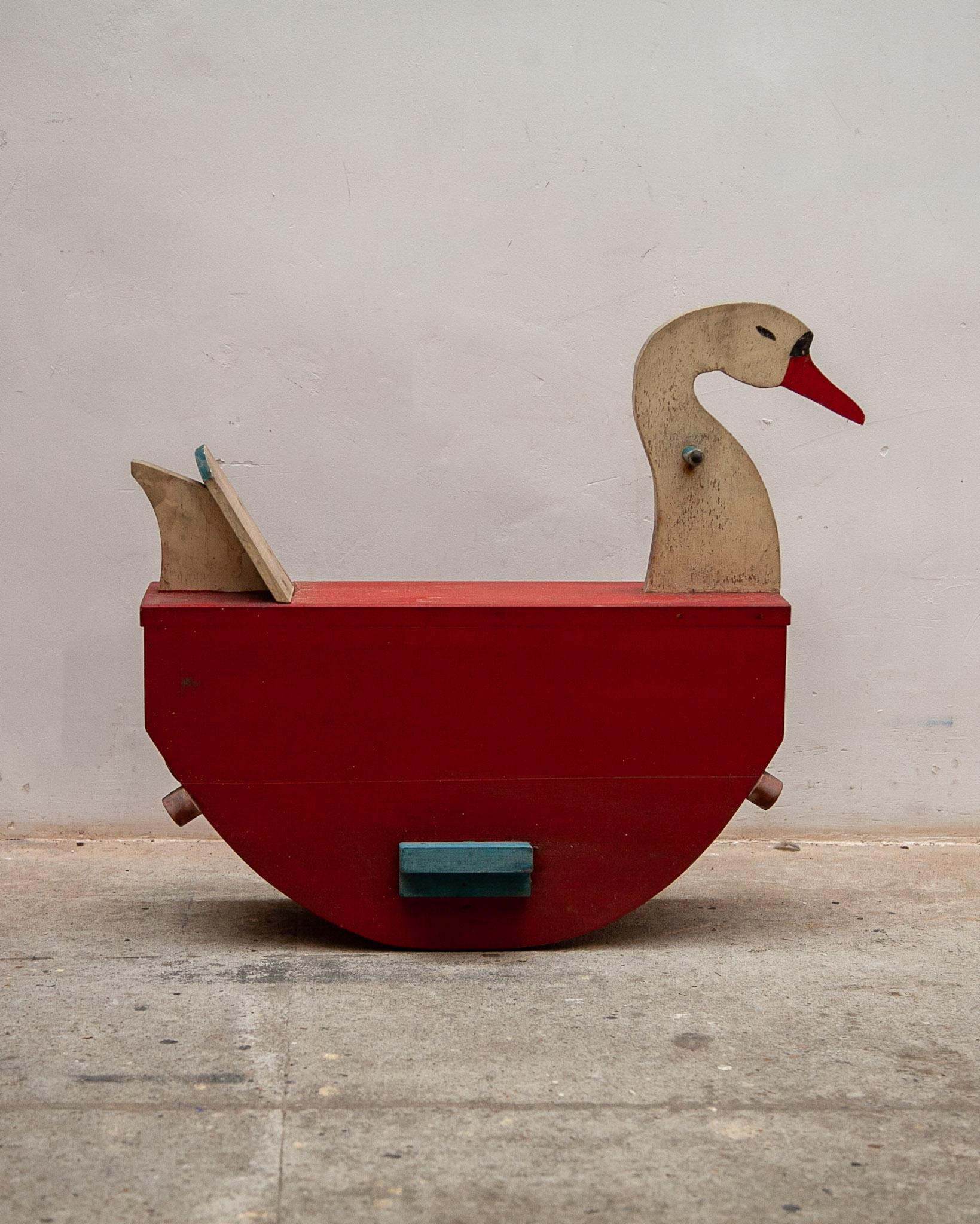 Swan rocking toy for children in handcrafted wood and original painted France 1950s. Sturdy and fun folk art with a good stability.


Really nice authentic fifties toy in good condition to use as a toy or as decoration in your interior.