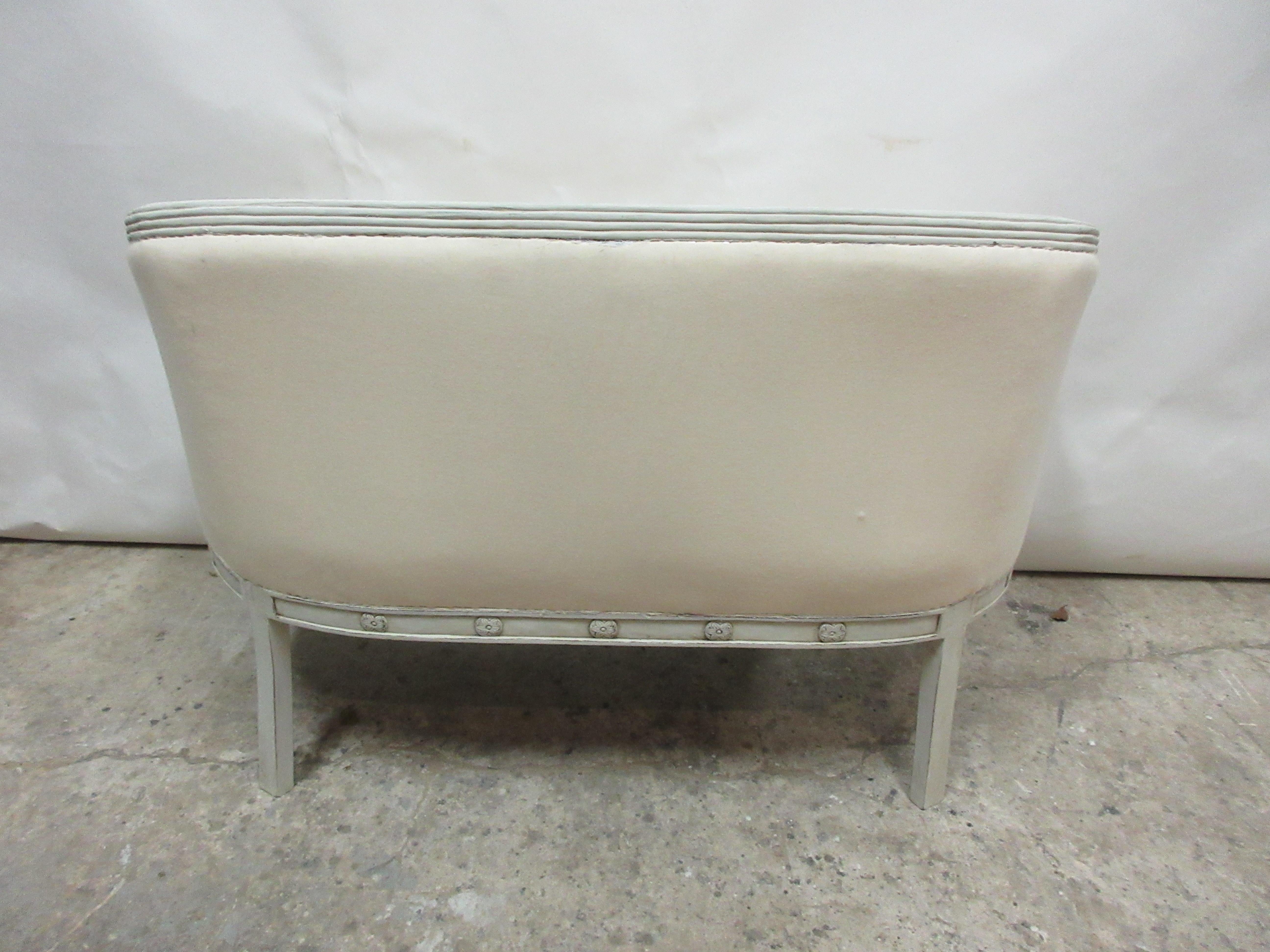 This is a Swan settee, its been restored and repainted with milk paints 