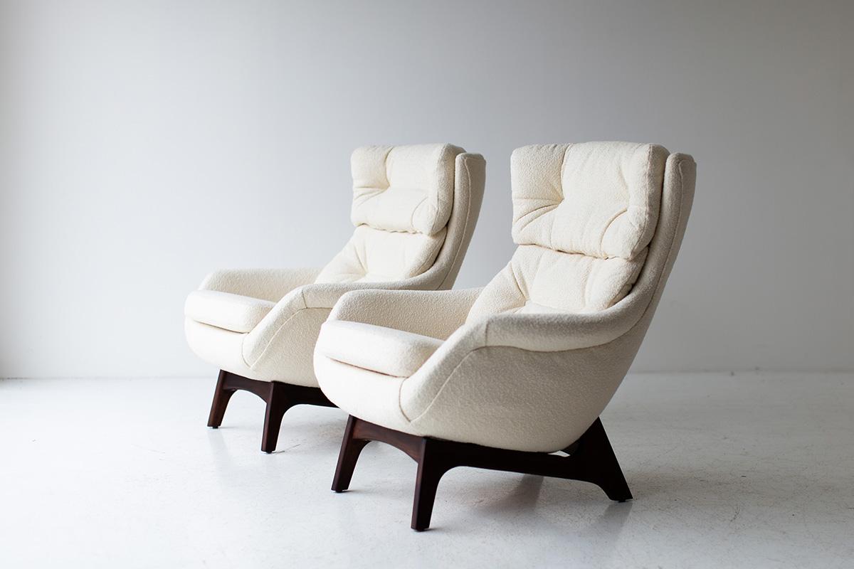 Designer: Adrian Pearsall. 

Manufacturer: Craft Associates Inc. 
Period or model: Mid-Century Modern. 
Specs: Knoll Boucle, Walnut. 

Condition: 

These Swanky Adrian Pearsall wing chairs for Craft Associates Inc. are in excellent restored