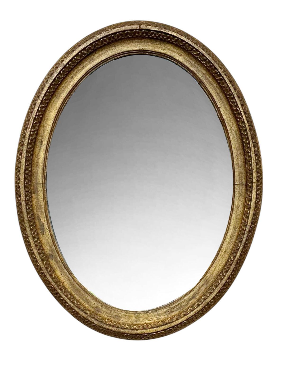 A pair oval gold wooden mirrors that came out of one of the swanky hotels in New York City back in the day. Originally from Italy, circa 1920s. 