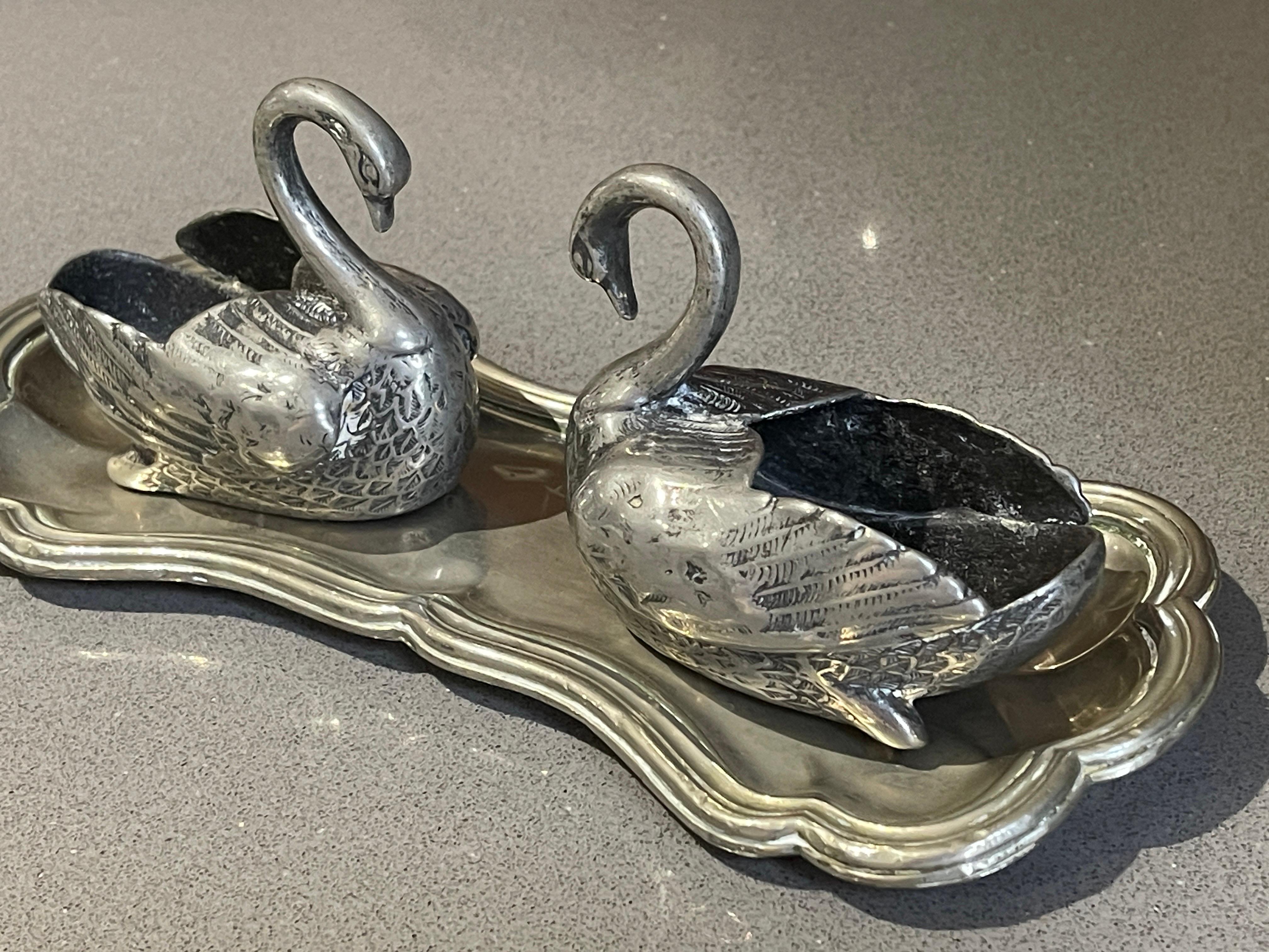 Silver Swan Vintage Salt and Pepper, Set of 2 with Tray
Antique valuable silver salt and pepper shaker or Decorative tableware pressed, cast and chased pair of swann. Oval, domed body on short, curve  All-encompassing C-curves in relief,