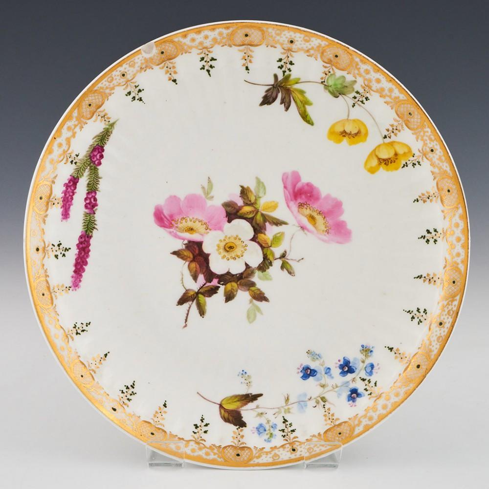 Swansea Porcelain Fluted Breakfast Cup and Saucer, c1816

Additional information:
Date : c1816
Period : George III
Marks : None
Origin : Swansea, Wales
Colour : Polychrome and gilt over white base; 
Pattern : saucer with central floral spray