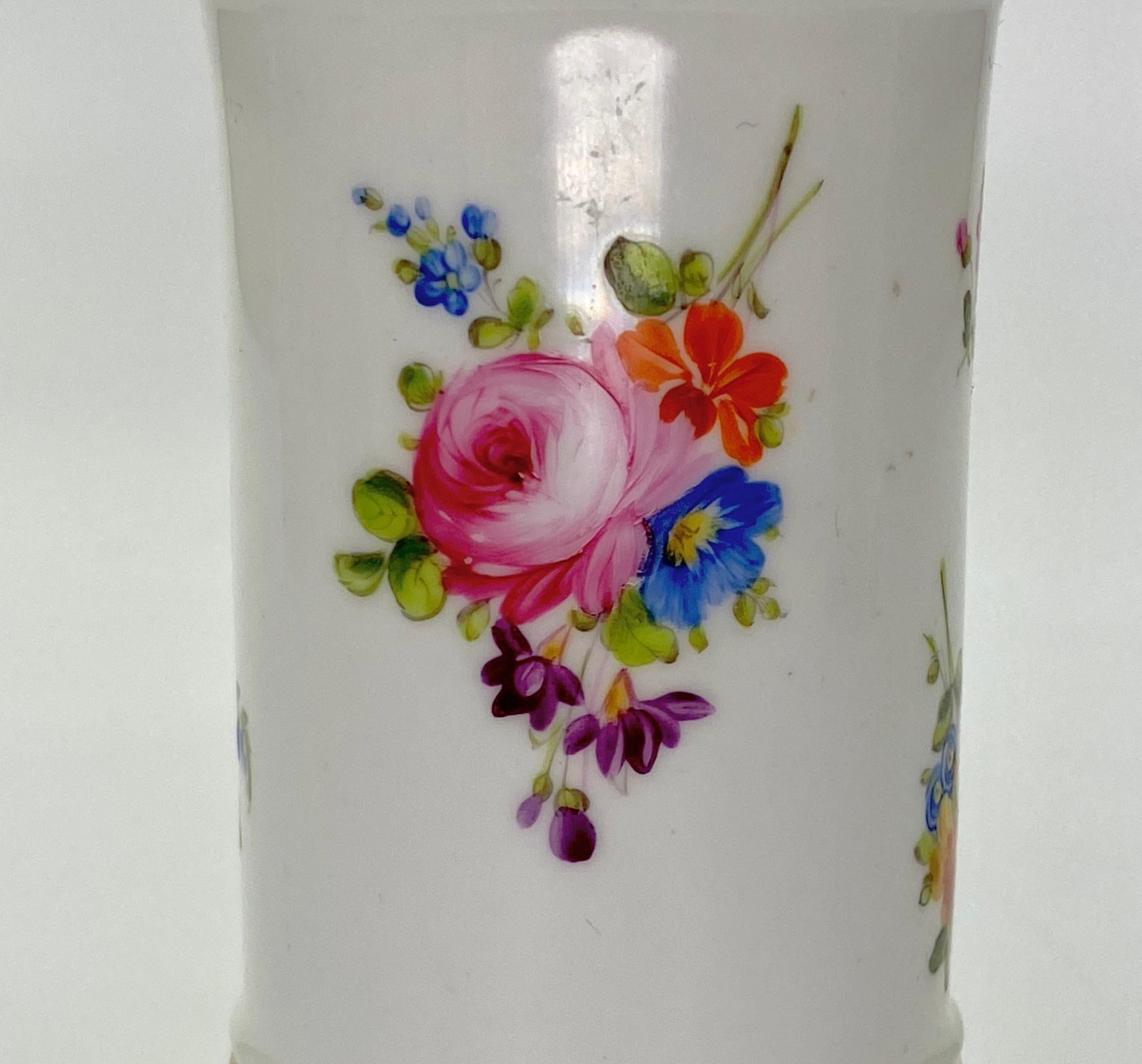 Swansea porcelain spill vase, circa 1815. The cylindrical vase, painted with large sprays of flowers, interspersed with smaller sprigs. The rim decorated with a gilt dentil motif.
Set upon a spreading circular pedestal foot.
Medium: