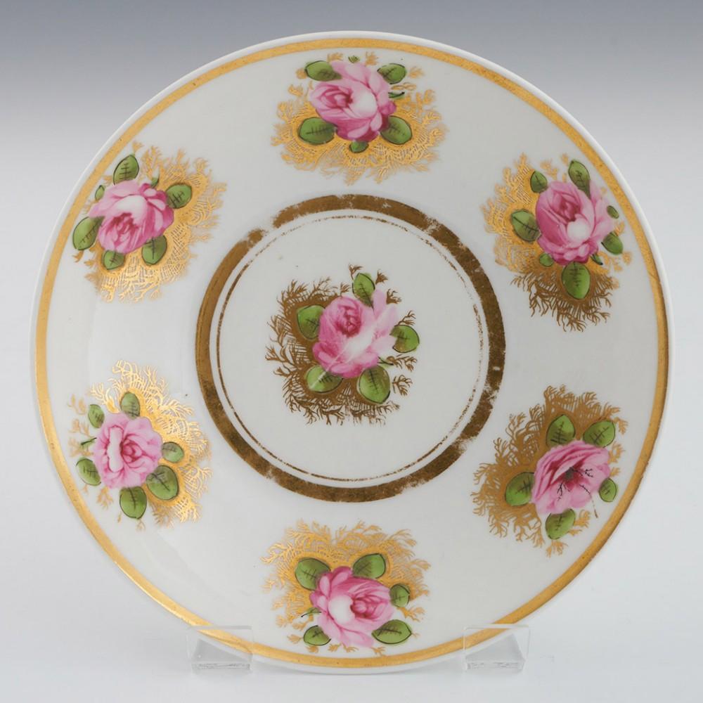 Heading :  Swansea Porcelain trio
Date : c1818
Period : Regency
Marks : Impressed SWANSEA mark to suacer
Origin : Swansea, Wales
Colour : Polychrome
Pattern : Typical swasnsea gilded rose design with pink and green enamels

Features: Gilt rims,
