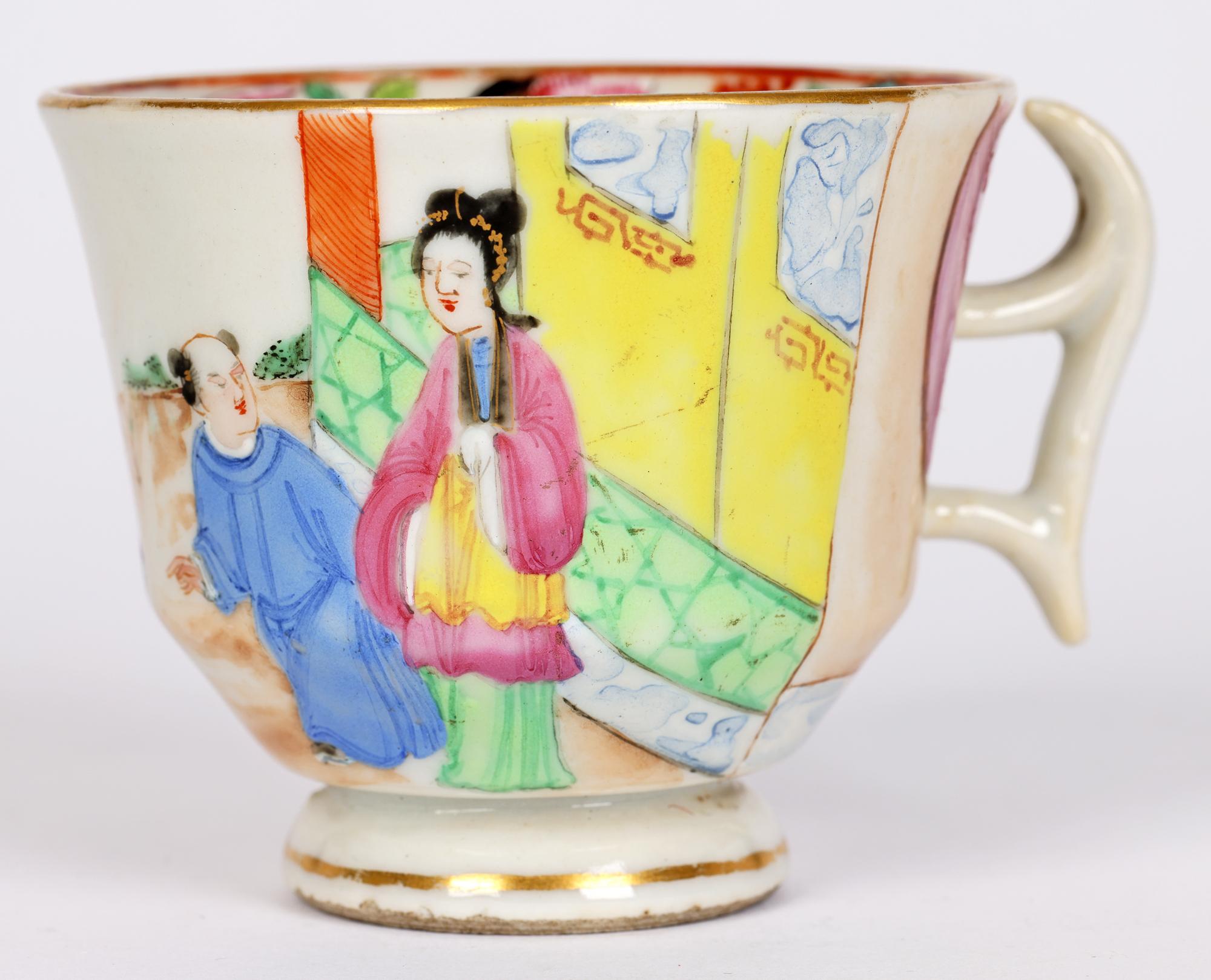 A rare and early pair Swansea, Welsh, hand painted porcelain breakfast cups hand painted in the Chinese famille rose style with the Mandarin pattern dating from around 1814. Both cups are similarly painted with Chinese figures, one lying beneath a