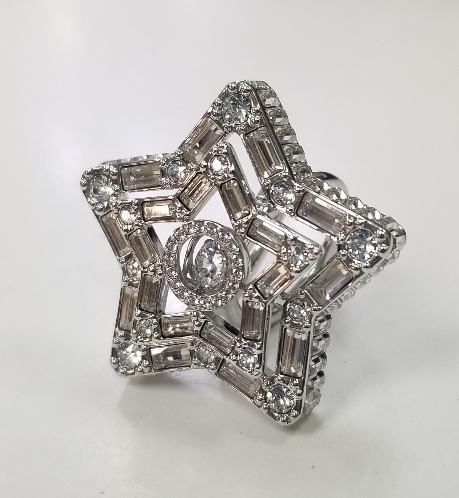 Swaroski Stella multi-shaped crystal Ring 
Collection:  Stella
Color:  White
Material:  Crystals, Rhodium plated, Zirconia
Size: 6.5