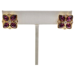 Used Swarovski 1980s Purple Rhinestone Flower Earrings