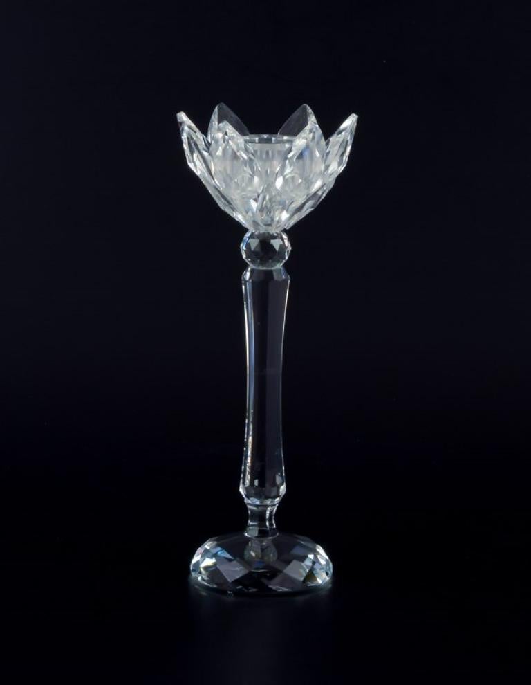 Austrian Swarovski, Austria. A pair of candle holders in faceted crystal. For Sale