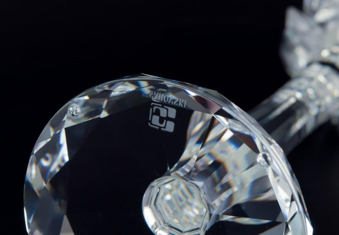 Swarovski, Austria. A pair of candle holders in faceted crystal. For Sale 1