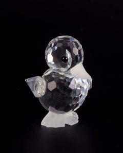 Swarovski, Austria. Four miniature bird figurines in faceted cut crystal glass.