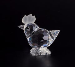 Swarovski, Austria. Four miniature figures in faceted cut crystal glass.