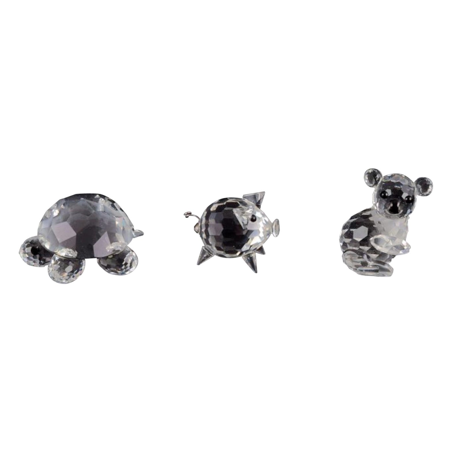 Swarovski, Austria. Three miniature figurines in faceted cut crystal glass