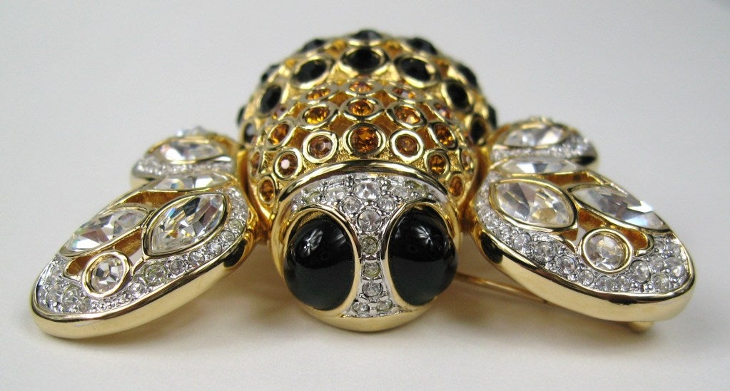 New, Never Worn Swarovski Amber, Black and Clear Swarovski Crystals are set through out this Big Bumble Bee. She measures 2.33 inches or / 59.39 mm top to bottom 2.63 inches or/ 66.93mm wide. This is out of a massive collection of Hopi, Zuni,