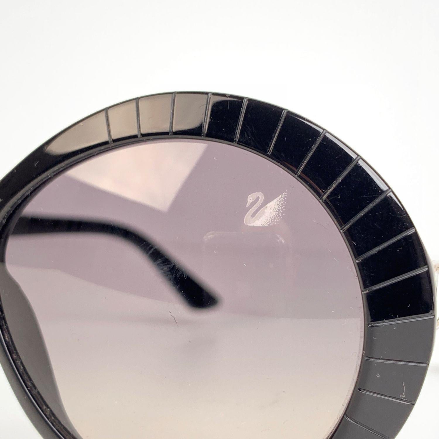 Women's Swarovski Black Round Sunglasses Dolce SW71 01 B 140 mm with Crystals